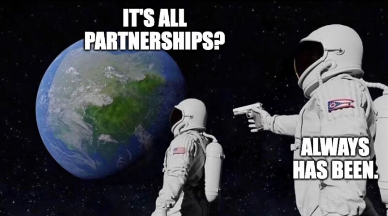 Meme. Astronauts in space. Caption one astronaut: "It's all partnerships." Caption over other astronaut with a gun: "always has been."